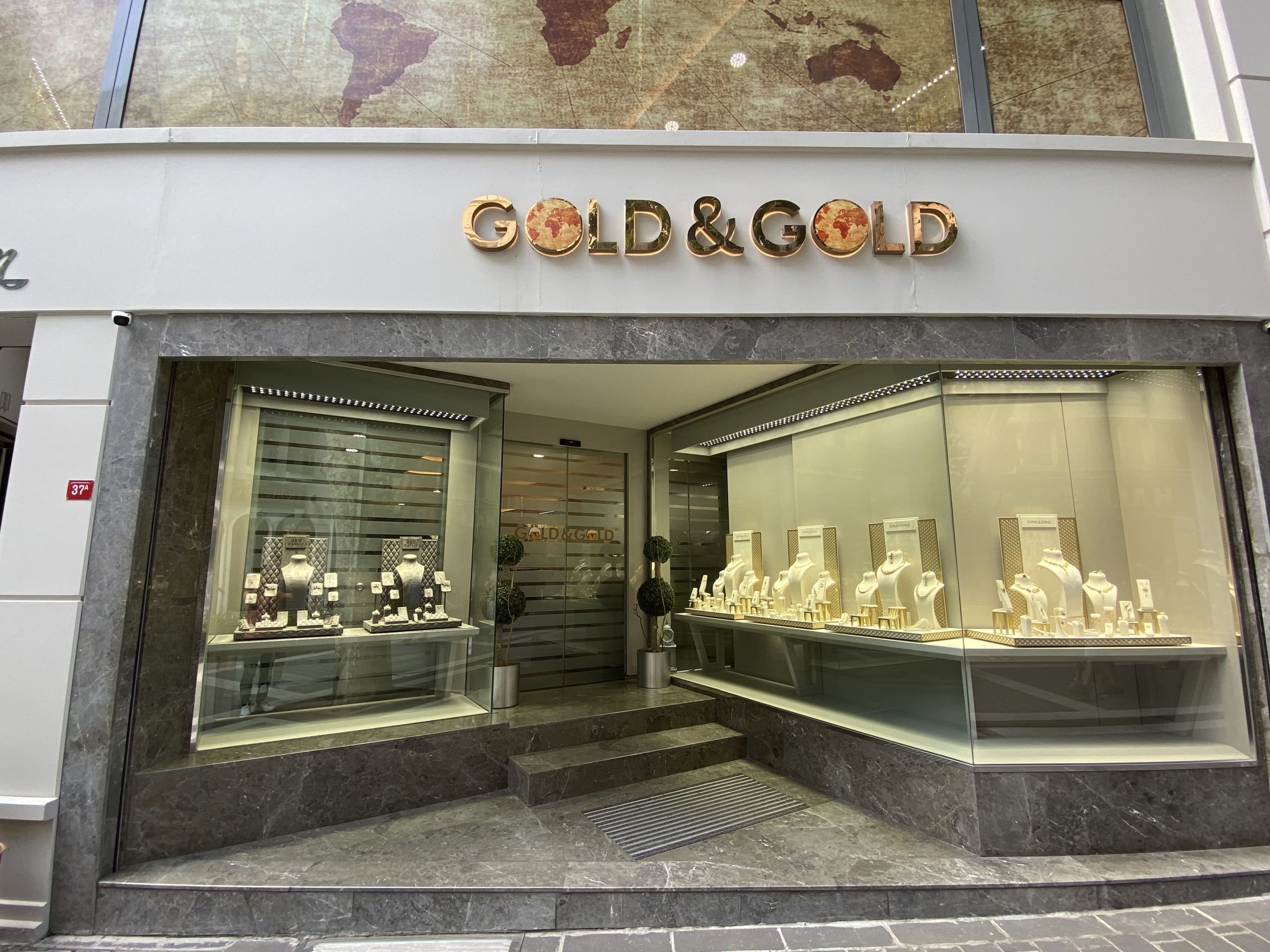 3 Jewelry store with world map backdrop